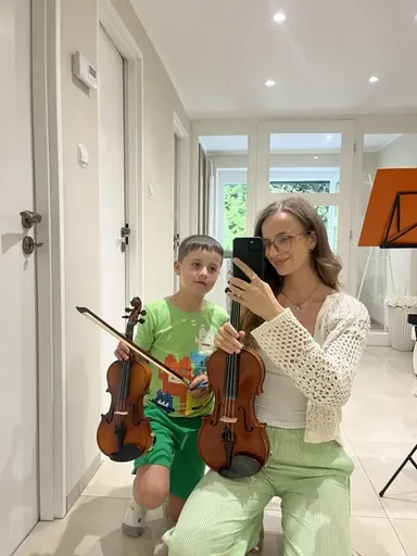 A student at a violin lesson in Kraków 6