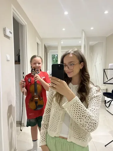 A student at a violin lesson in Kraków 7