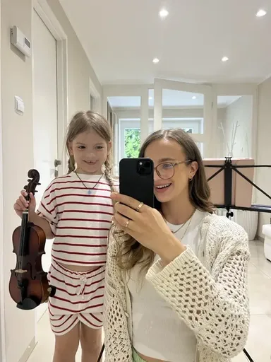 A student at a violin lesson in Kraków 10