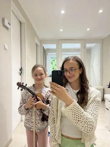 A student at a violin lesson in Kraków 11