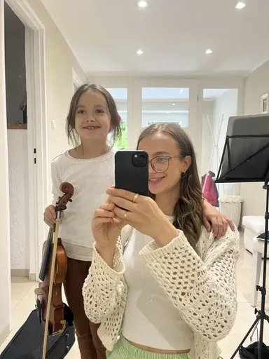 A student at a violin lesson in Kraków 13