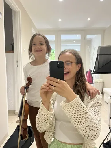 A student at a violin lesson in Kraków 14