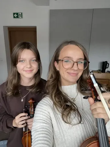 A student at a violin lesson in Kraków 17
