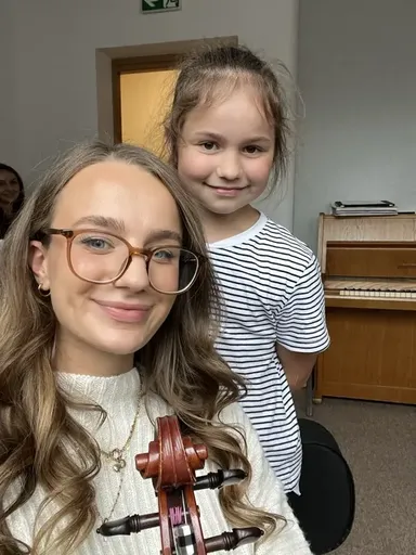 A student at a violin lesson in Kraków 20